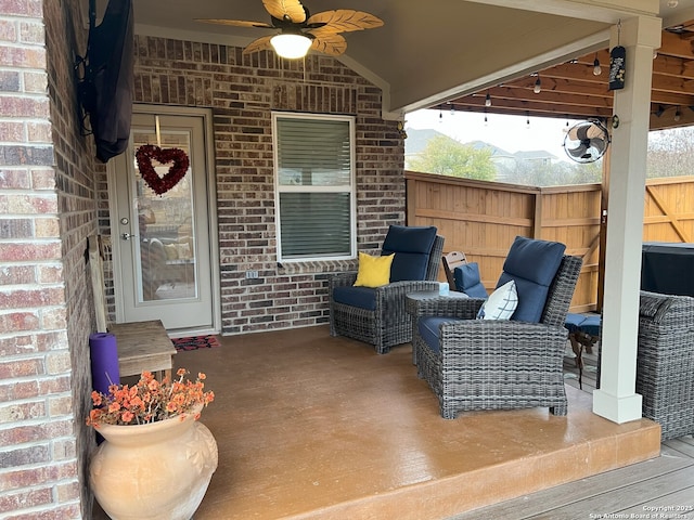 view of patio / terrace featuring ceiling fan