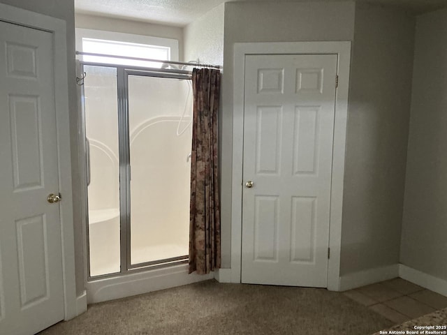 bathroom featuring a textured ceiling