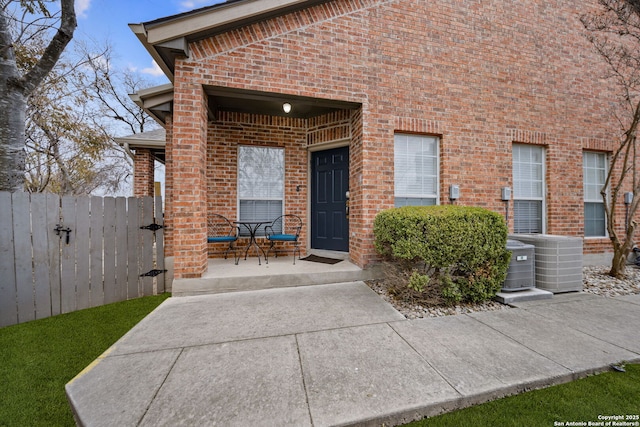 doorway to property with cooling unit