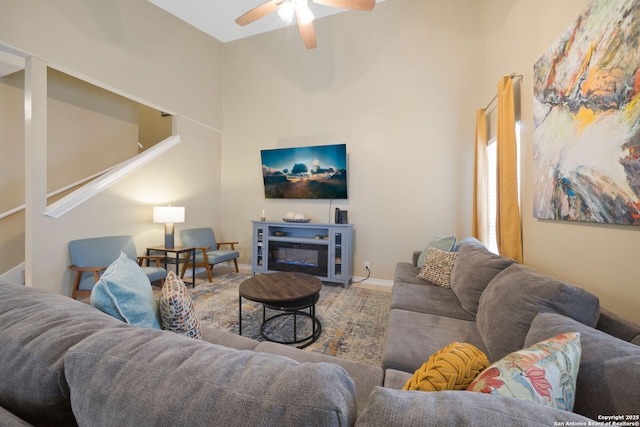 living room featuring ceiling fan