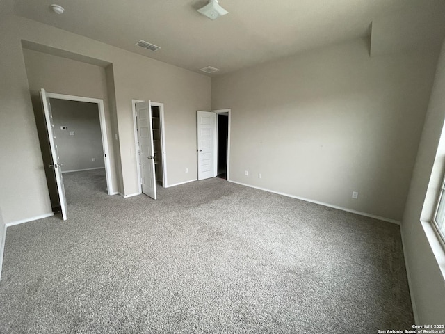 unfurnished bedroom featuring carpet flooring