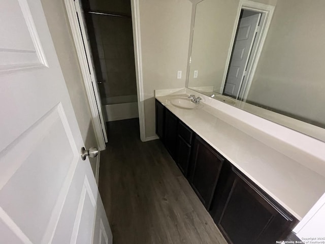 bathroom with vanity and hardwood / wood-style floors