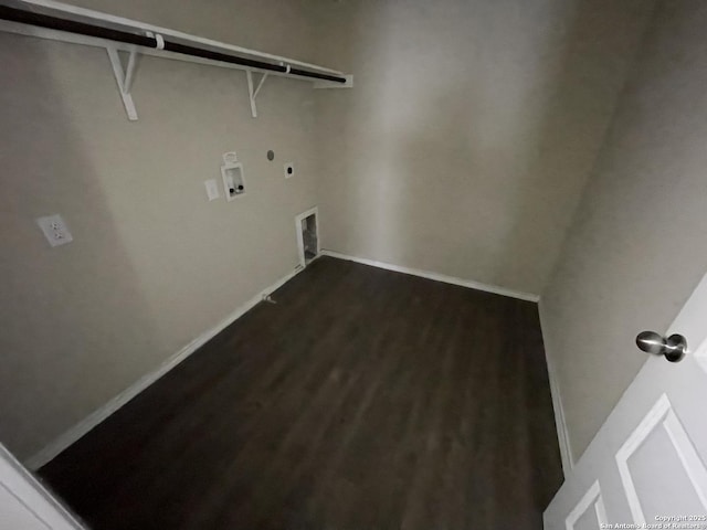 washroom featuring washer hookup, dark wood-type flooring, and hookup for an electric dryer