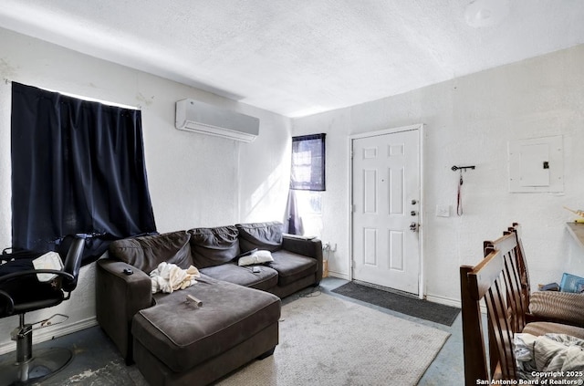 living room with a wall mounted air conditioner, electric panel, and a textured ceiling