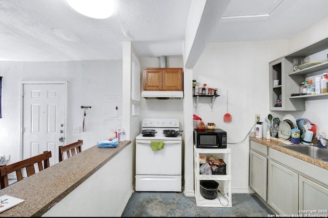 kitchen featuring sink, white electric range oven, and a textured ceiling