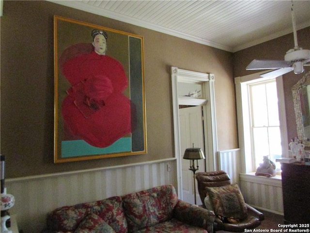 living room with ceiling fan, ornamental molding, and wooden ceiling