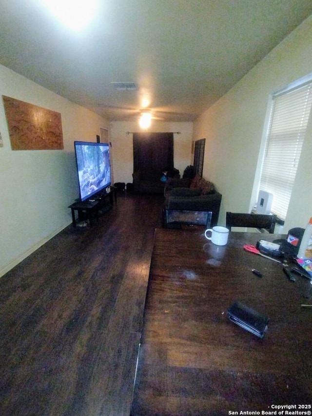 living room with dark hardwood / wood-style floors