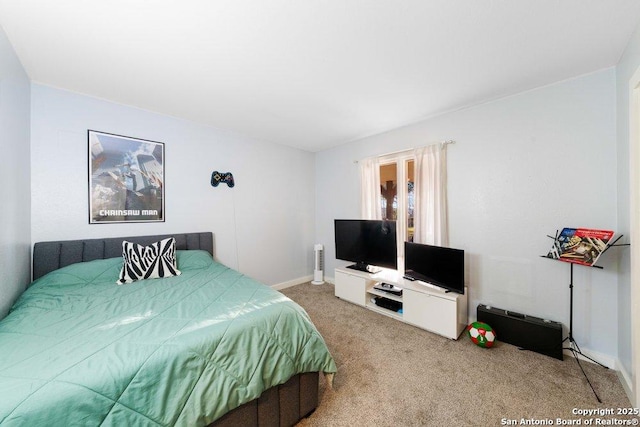 bedroom featuring carpet