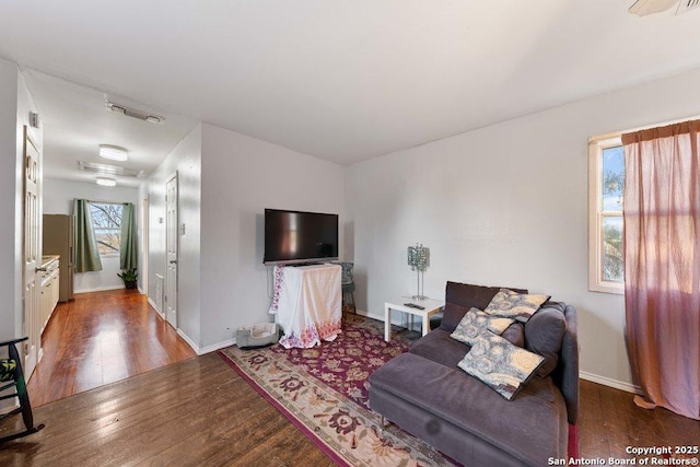 living room featuring dark hardwood / wood-style flooring