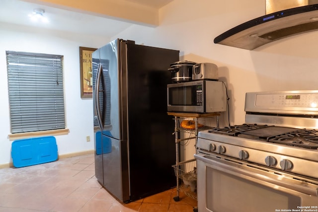 kitchen featuring light tile patterned flooring, range hood, beamed ceiling, and appliances with stainless steel finishes