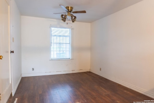 unfurnished room featuring dark hardwood / wood-style floors and ceiling fan