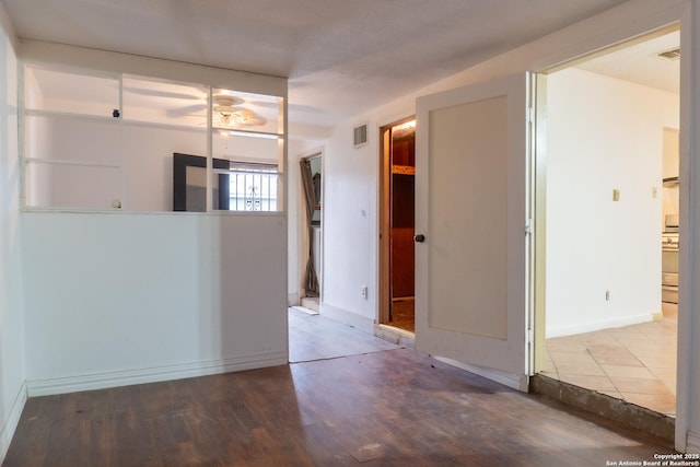 unfurnished room featuring wood-type flooring