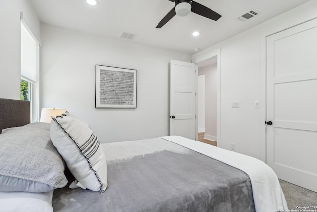 bedroom with a ceiling fan, recessed lighting, and visible vents