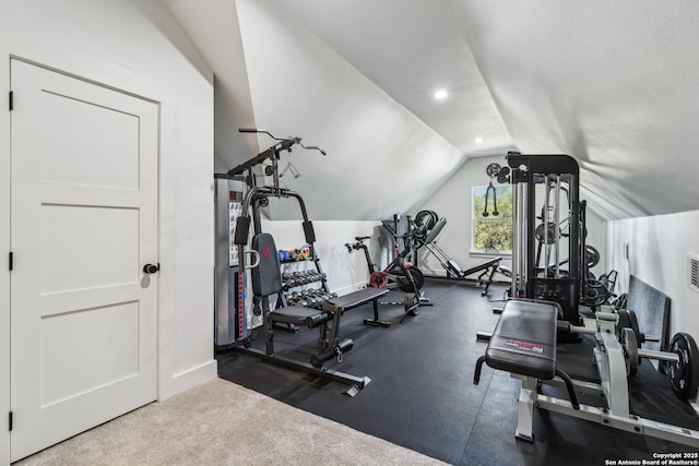 workout area featuring lofted ceiling and recessed lighting