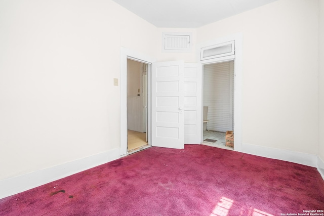 unfurnished bedroom featuring carpet floors