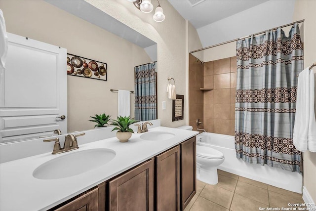 full bathroom with shower / tub combo with curtain, lofted ceiling, toilet, vanity, and tile patterned flooring