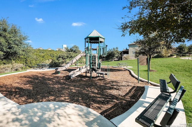 view of jungle gym with a lawn