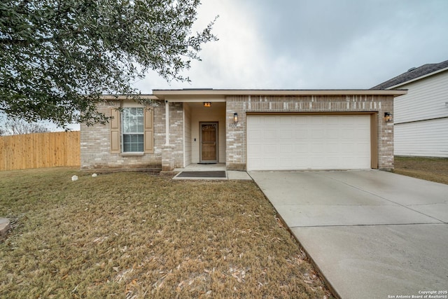 view of front of house with a garage and a front yard