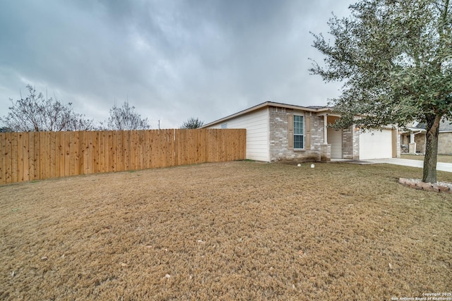 view of yard featuring a garage