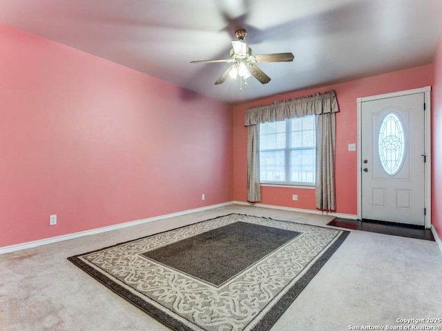 foyer with ceiling fan