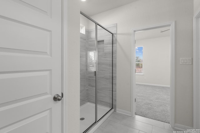 bathroom featuring tile patterned floors and walk in shower