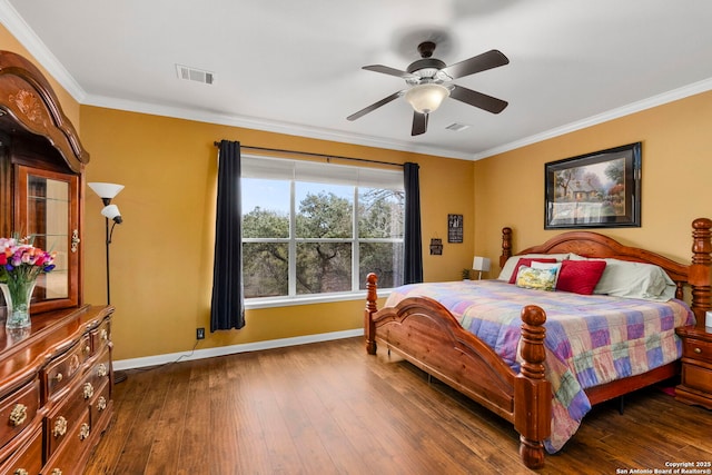 bedroom featuring crown molding, hardwood / wood-style floors, and ceiling fan