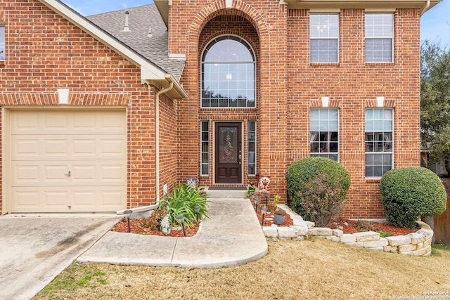 entrance to property featuring a garage