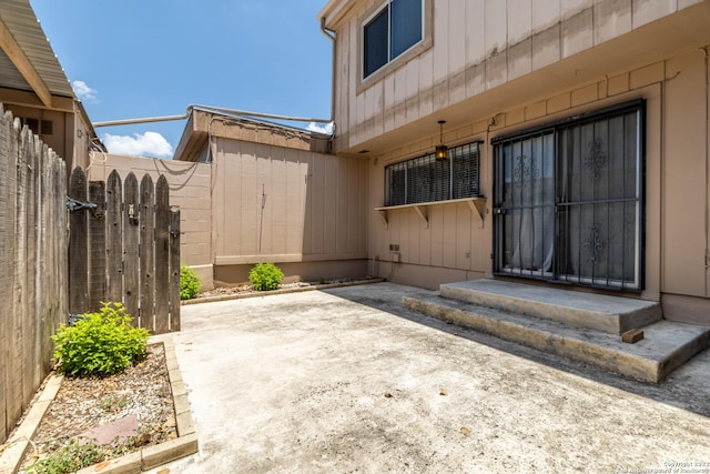 doorway to property featuring a patio