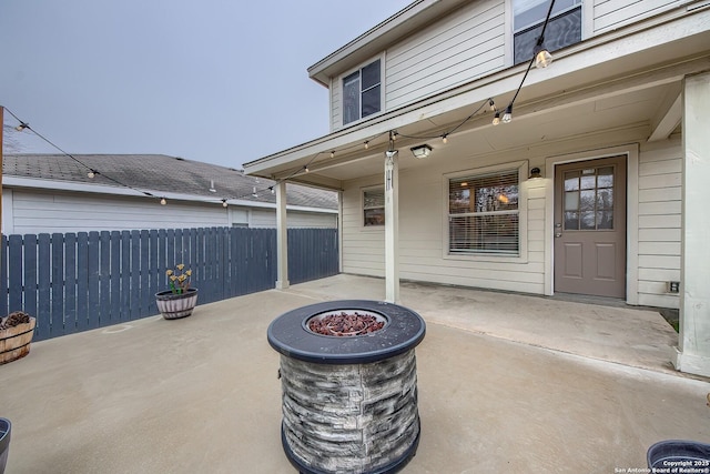 view of patio / terrace featuring a fire pit