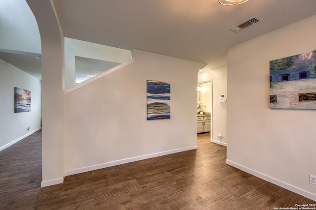 hall featuring dark hardwood / wood-style floors