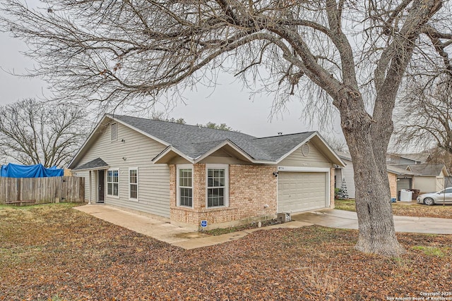 single story home featuring a garage