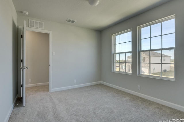 view of carpeted spare room