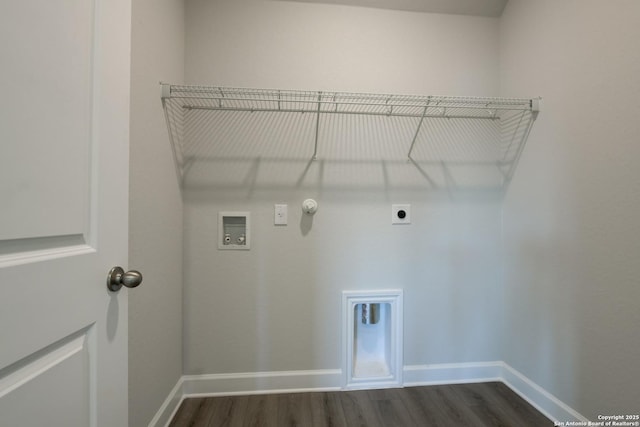 laundry area with gas dryer hookup, dark hardwood / wood-style floors, hookup for an electric dryer, and hookup for a washing machine