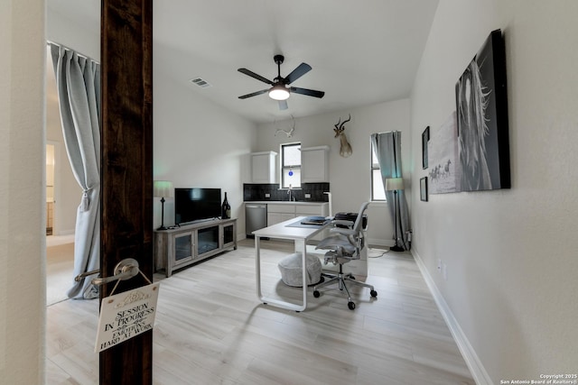 office area with ceiling fan and light wood-type flooring