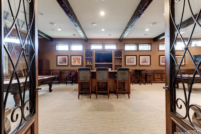 playroom with billiards, beam ceiling, and light carpet