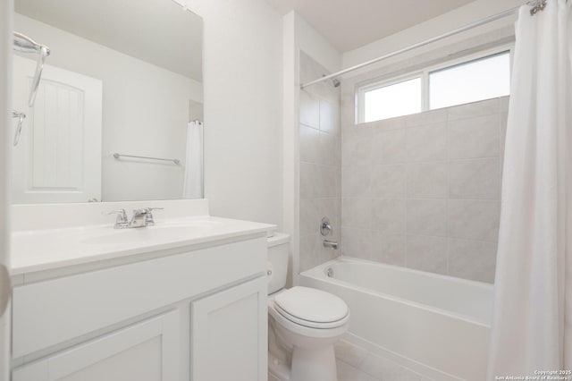 full bathroom with tile patterned floors, vanity, toilet, and shower / tub combo