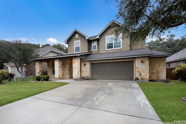 view of front facade featuring a garage and a front yard