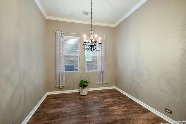 unfurnished dining area with ornamental molding, dark hardwood / wood-style flooring, and a notable chandelier