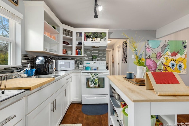 kitchen with wood counters, white cabinetry, dark hardwood / wood-style flooring, white appliances, and decorative backsplash