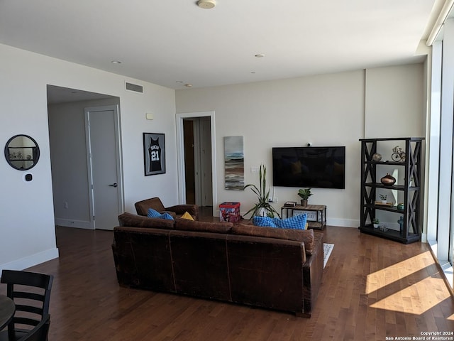 living room featuring dark hardwood / wood-style floors