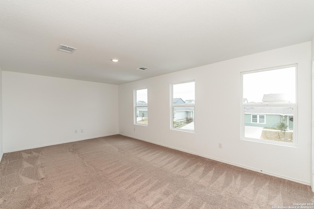 unfurnished room with carpet