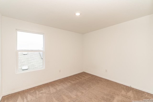 view of carpeted spare room