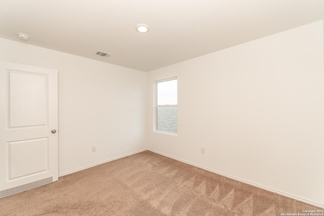 empty room featuring carpet