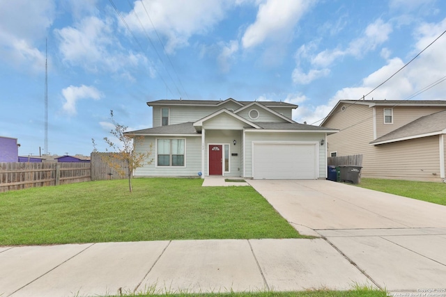 view of front of house featuring a garage and a front lawn