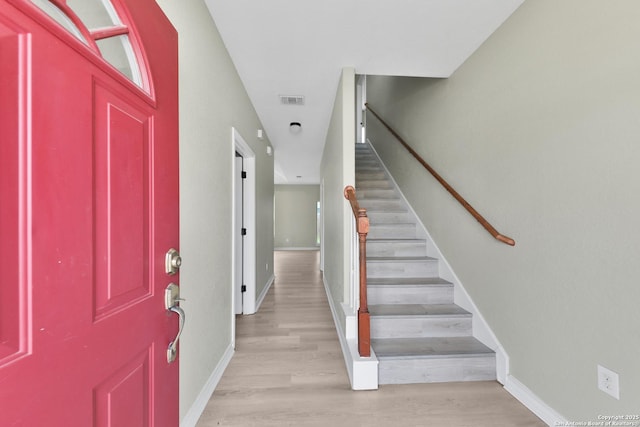 foyer with light wood-type flooring