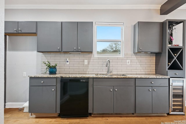 kitchen featuring gray cabinets, black dishwasher, sink, beverage cooler, and light stone countertops