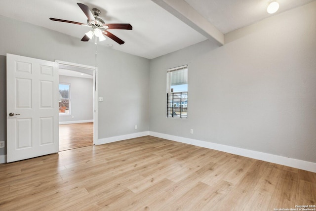 unfurnished room featuring beam ceiling, ceiling fan, and light hardwood / wood-style floors