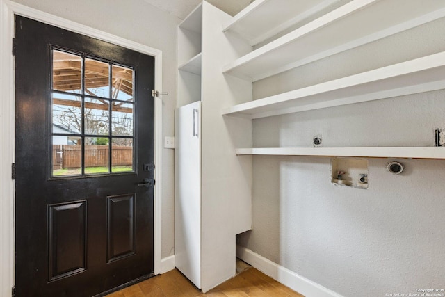 doorway featuring light wood-type flooring