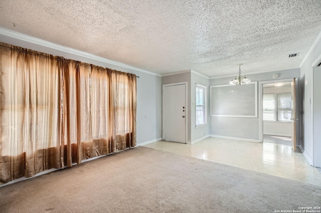 interior space with an inviting chandelier and a textured ceiling