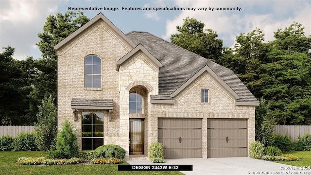 french country home featuring a garage